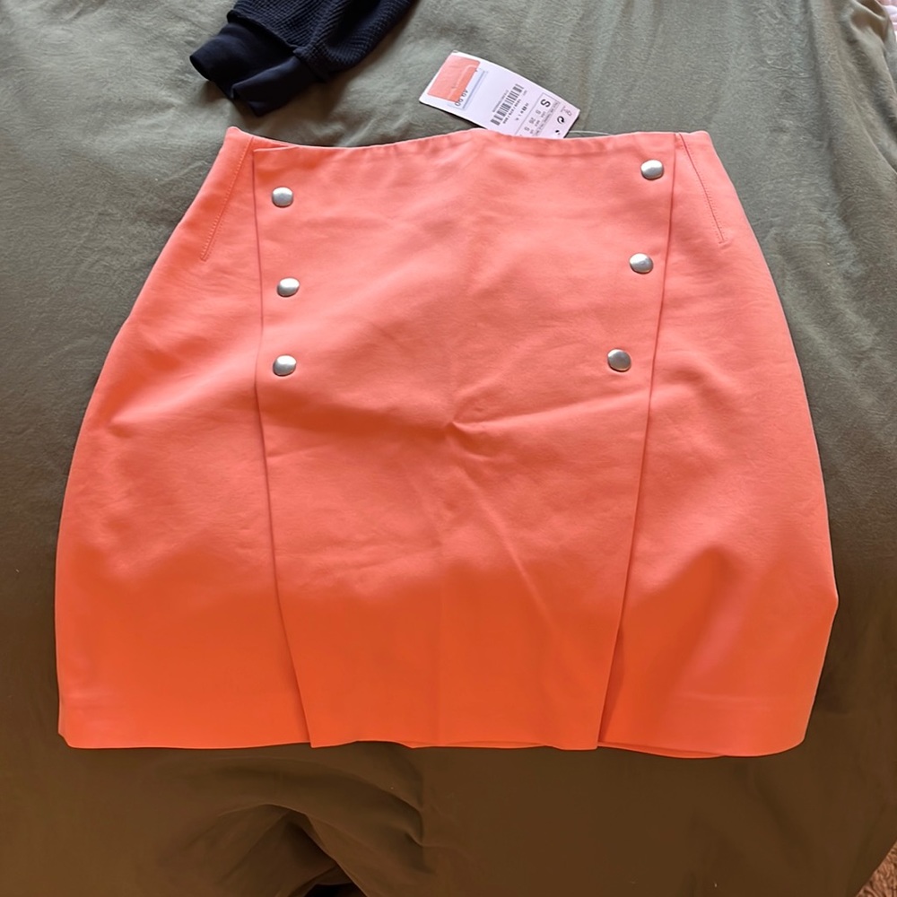 ORANGE SKIRT WITH BUTTONS